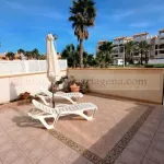 Venta de Espectacular Piso Bajo en Playa Islas Menores con Amplio Porche y Piscina Comunitaria 17