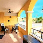 Venta de Espectacular Piso Bajo en Playa Islas Menores con Amplio Porche y Piscina Comunitaria 19