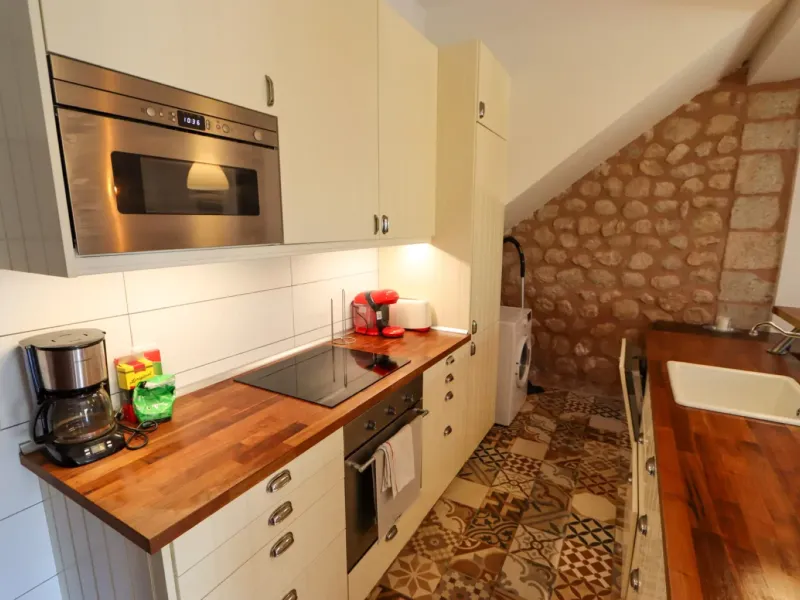 A two-apartment house on a quiet street, featuring a private pool