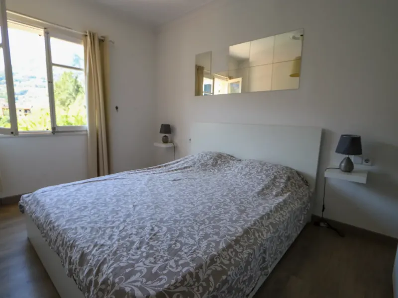 A two-apartment house on a quiet street, featuring a private pool