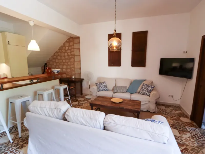 A two-apartment house on a quiet street, featuring a private pool