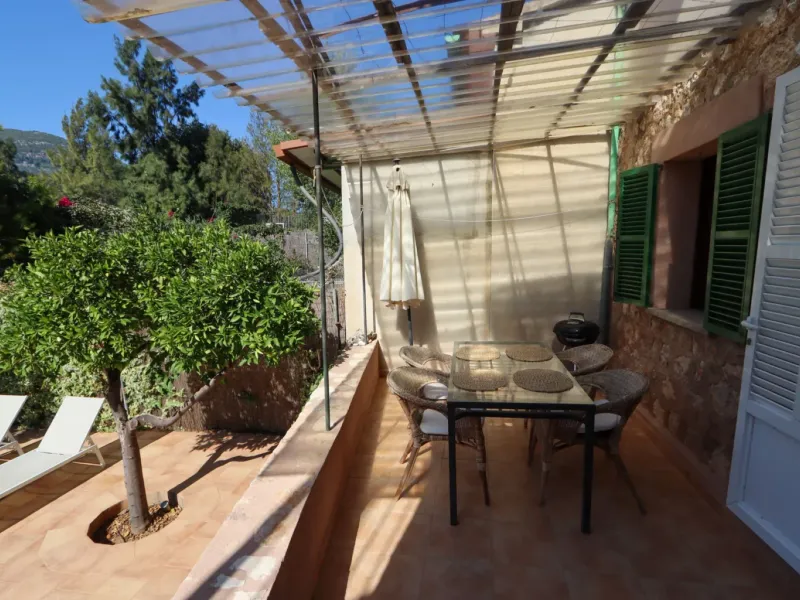 A two-apartment house on a quiet street, featuring a private pool