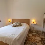 A two-apartment house on a quiet street, featuring a private pool 10