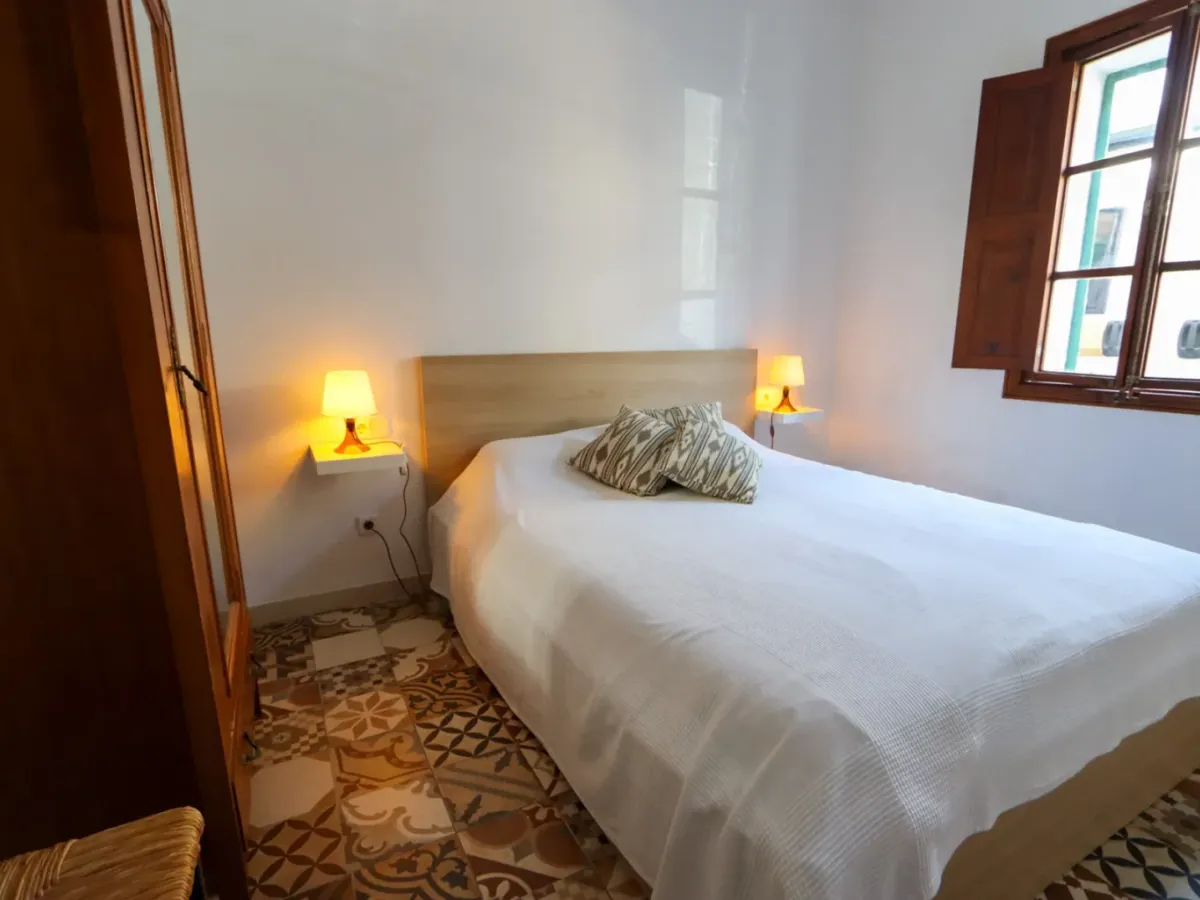 A two-apartment house on a quiet street, featuring a private pool