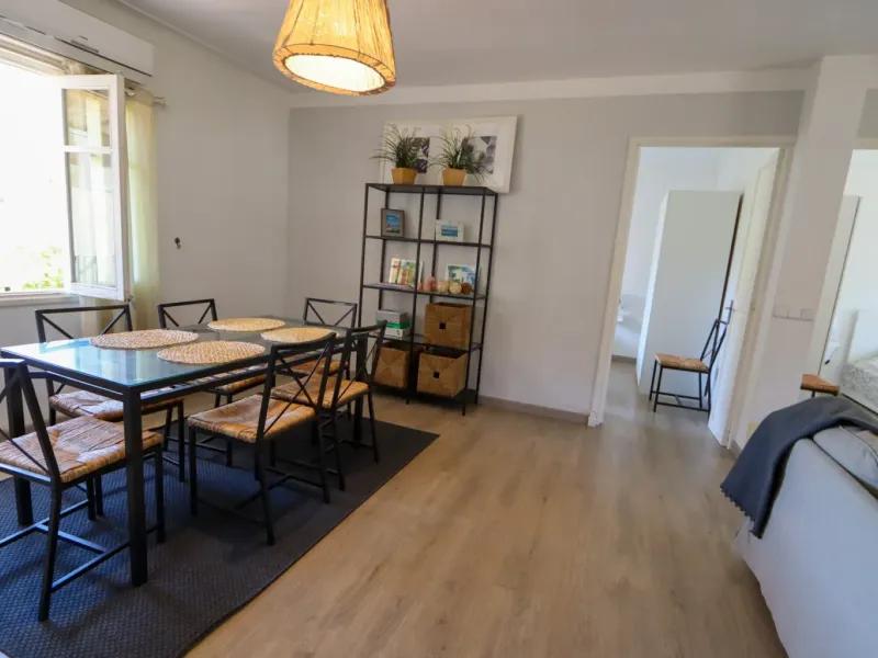 A two-apartment house on a quiet street, featuring a private pool