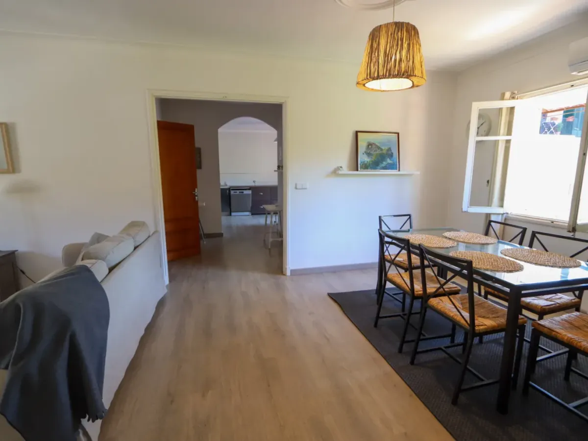 A two-apartment house on a quiet street, featuring a private pool