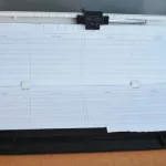 Agenda telefónica com calculadora solar dos anos 8 2