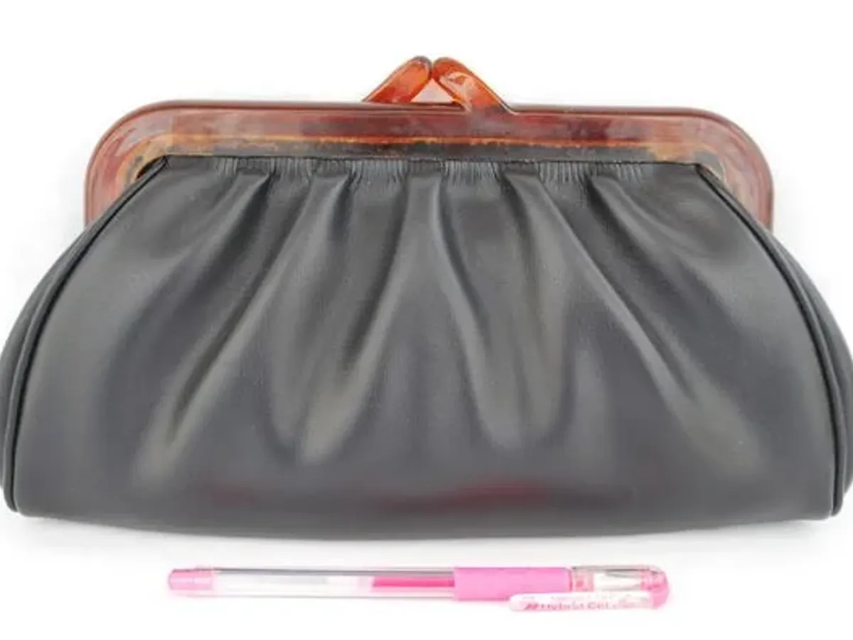 Mala de mão dos anos 60, em pele, da casa Galeão