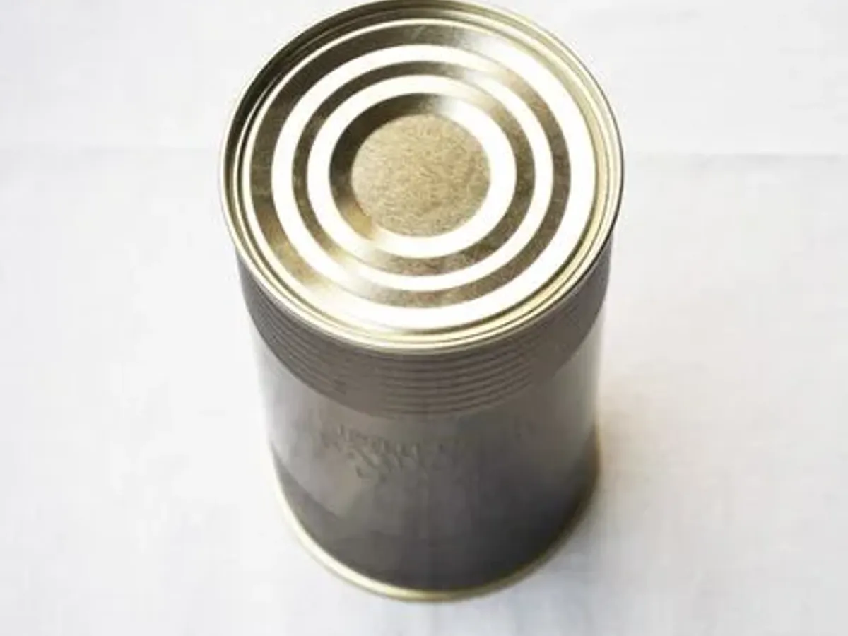 Lata de perfume “Le Male” de Jean Paul Gaultier