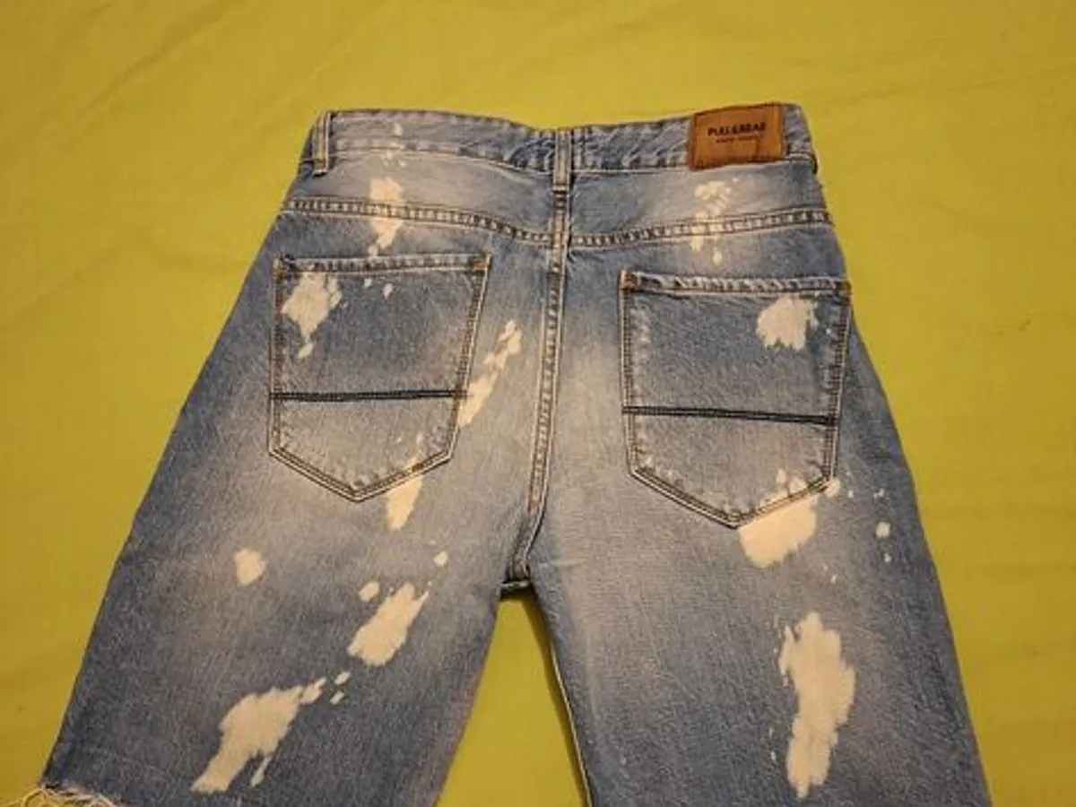 calções descontraídos em ganga