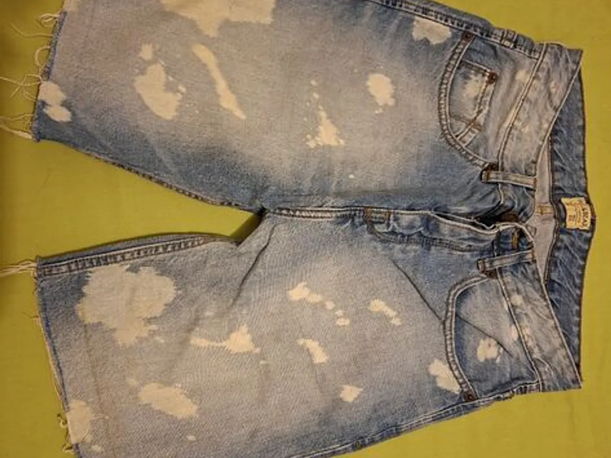 calções descontraídos em ganga