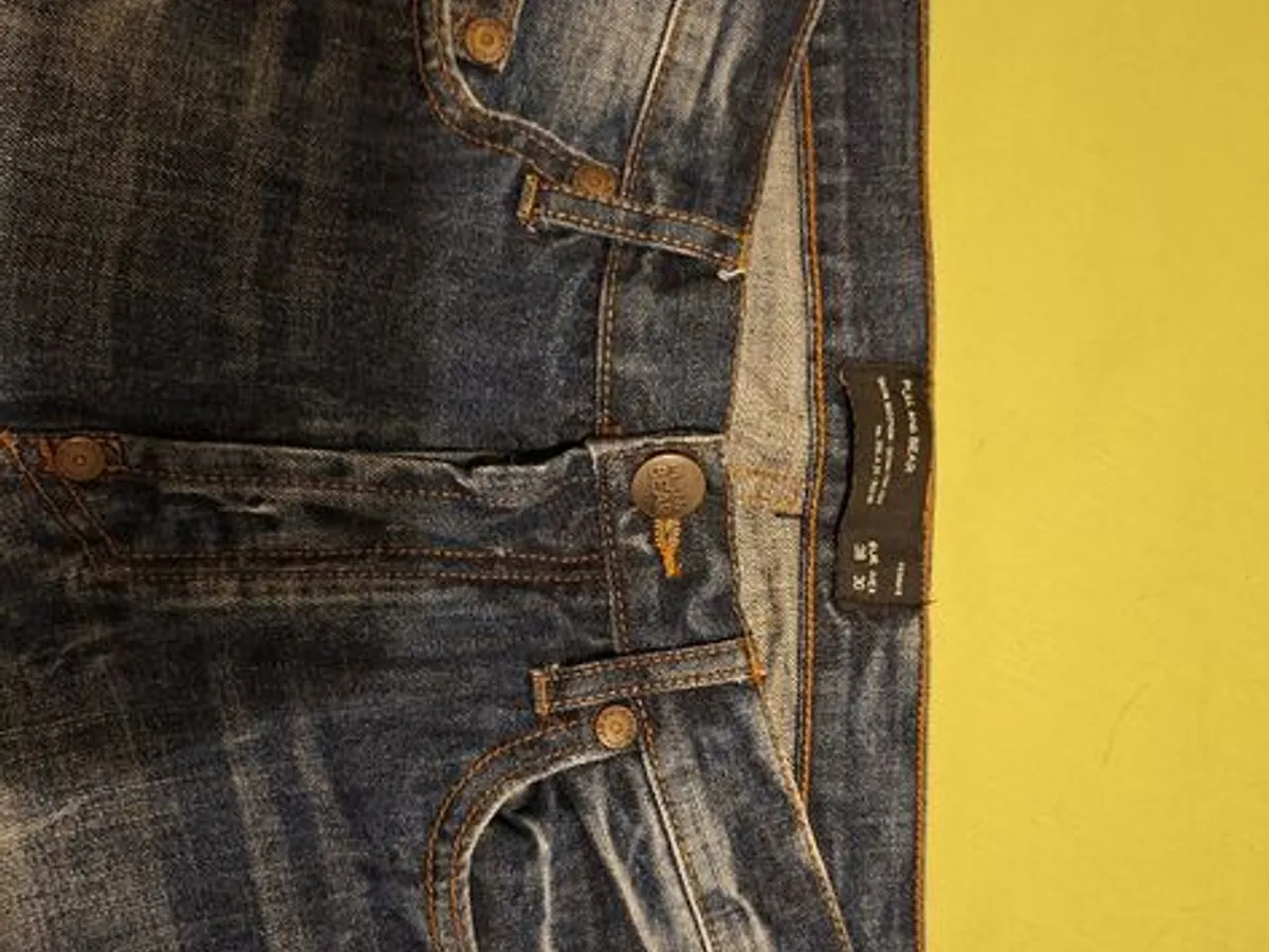 calções descontraídos em ganga