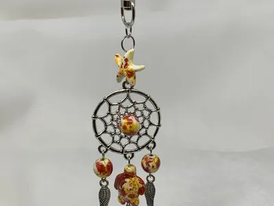 Porta-chaves c/ contas e tartaruga amarelo