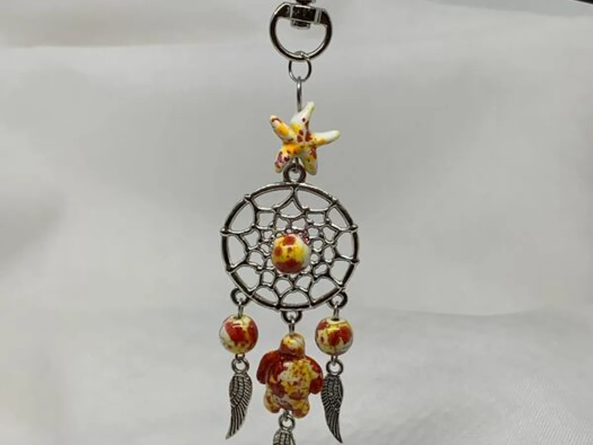 Porta-chaves c/ contas e tartaruga amarelo