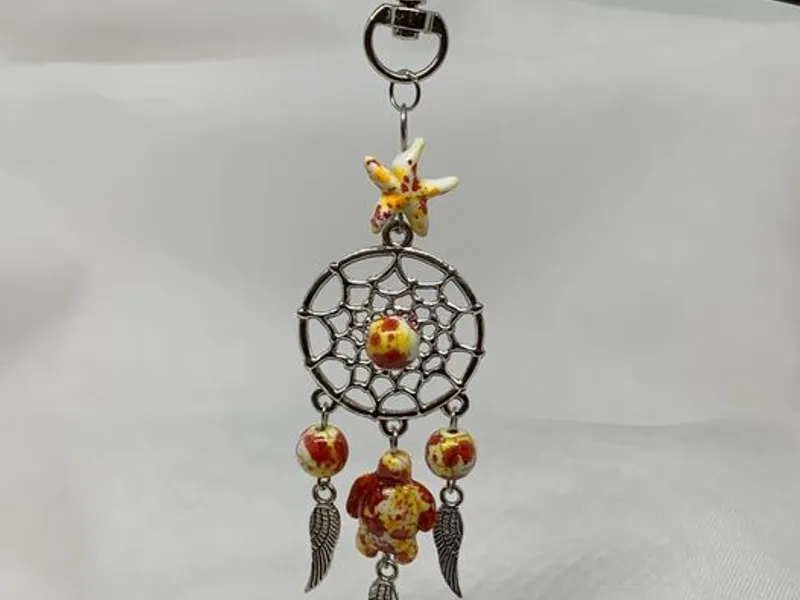 Porta-chaves c/ contas e tartaruga amarelo