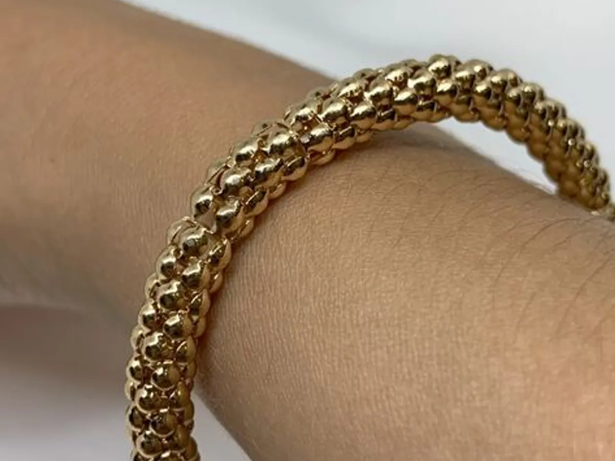 Pulseira Elástica Dourada com Efeito de Esferas - 