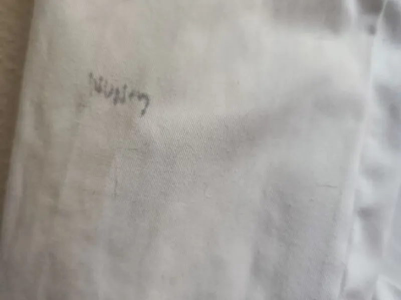 Bata médica ou escolar unisexo em bom estado 