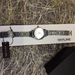 Relógio de pulso feminino prateado em aço Skyline  9