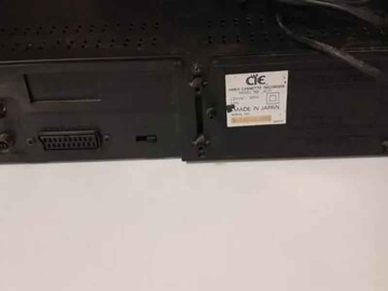 Leitor VHS e lote de cassetes